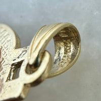 10k Gold Polished and Textured Dollar Sign Pendant