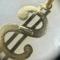 10k Gold Polished and Textured Dollar Sign Pendant