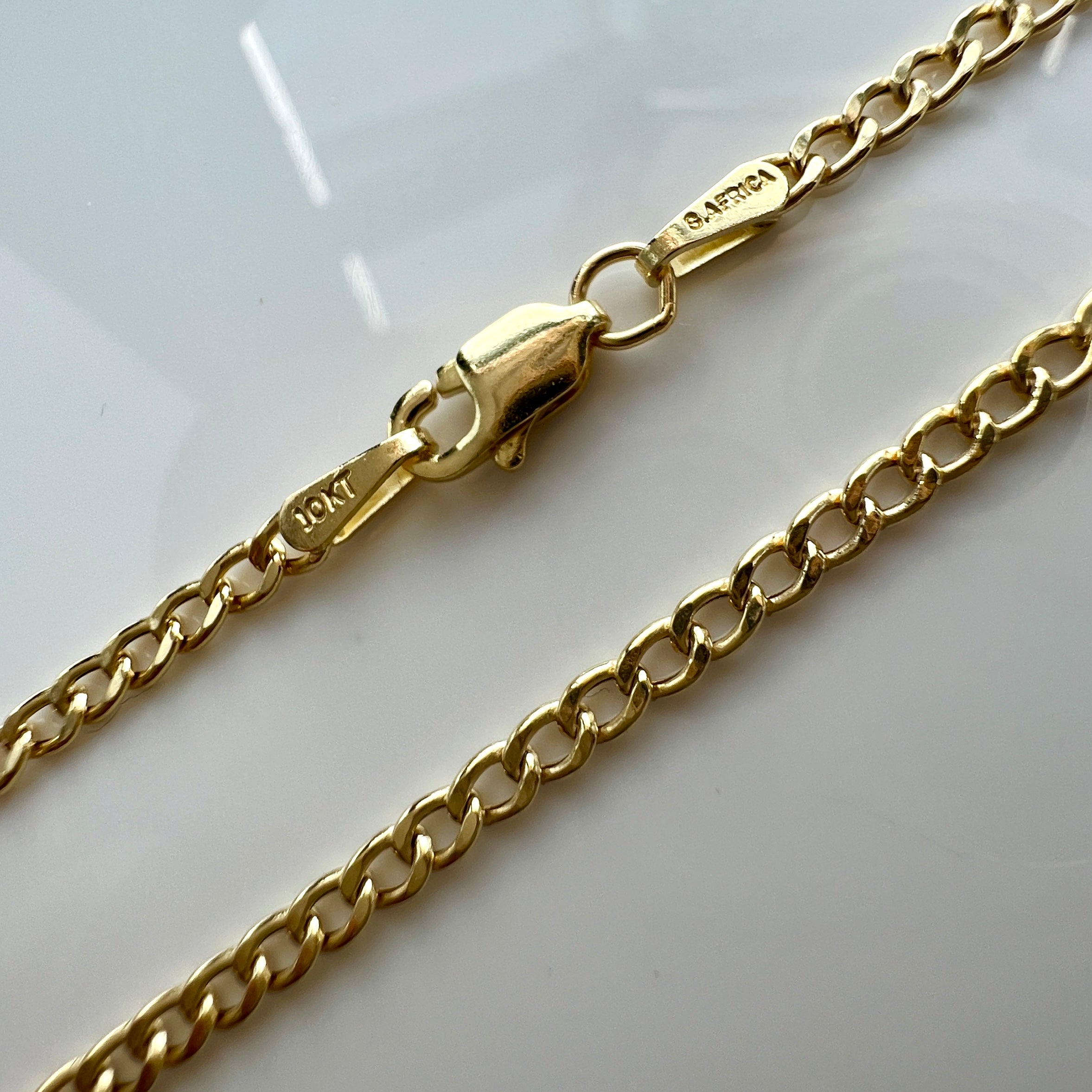 10K Yellow Gold 2.5mm 7" Curb Link Bracelet